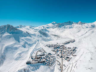 Experience the ultimate alpine lifestyle in this stunning ski resort village nestled amidst majestic snow-capped mountains.