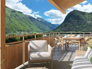 Experience breathtaking mountain views from this stunning balcony, perfect for al fresco dining or relaxing with a cup of coffee.