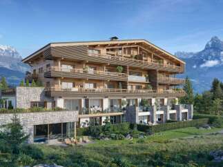 Experience luxury mountain living in this stunning alpine residence, featuring a modern wooden facade and expansive balconies with breathtaking mountain views.