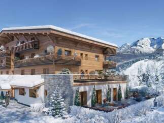 Experience luxury mountain living in this stunning chalet, featuring a modern design with warm wooden accents and expansive balconies offering breathtaking alpine views.