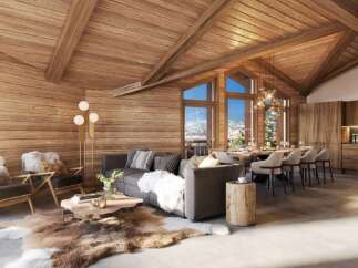 Experience luxurious mountain living in this stunning chalet, featuring a spacious open-plan living and dining area with a modern kitchen.