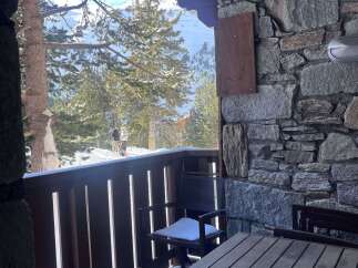 Experience the ultimate mountain retreat with this stunning property offering breathtaking views of snow-covered slopes and pine forests.