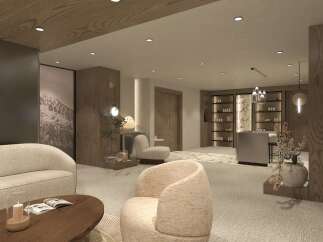 Experience tranquility in this beautifully designed waiting area, featuring plush seating and warm wood accents.