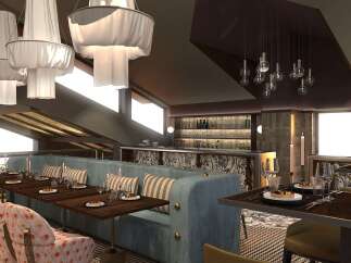 Experience sophisticated dining in this elegantly designed restaurant, featuring plush booth seating and stylish armchairs.
