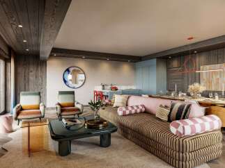 Experience modern mountain living in this stunning open-concept living and dining area.