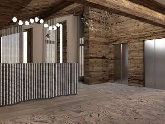 Experience luxury mountain living in this stunning lodge-inspired lobby, featuring a chic reception desk and elegant lighting.