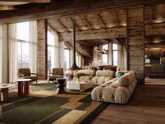 Experience luxurious mountain living in this stunning chalet, featuring a grand living area with a suspended fireplace and panoramic windows showcasing breathtaking snowy vistas.