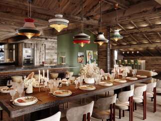Experience luxurious mountain living in this stunning chalet, featuring a grand dining area with a rustic wooden table set for a feast.