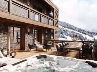 Experience ultimate luxury in this mountain retreat, featuring a private hot tub on a spacious deck with breathtaking snowy mountain views.