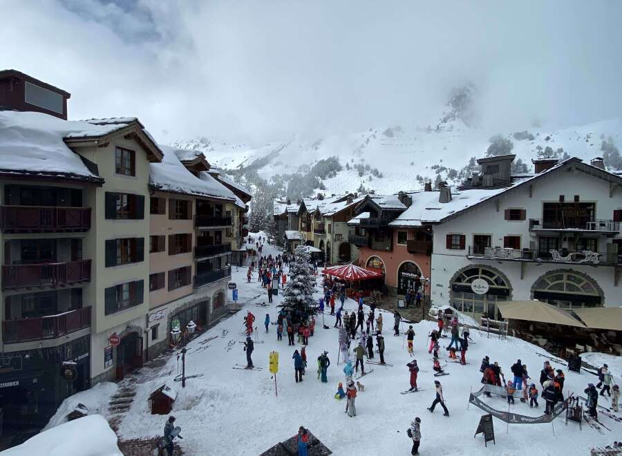 Experience the charm of this ski resort village, featuring traditional alpine architecture dusted with fresh snow.
