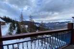 Experience breathtaking mountain views from this stunning property, perfect for a ski getaway.