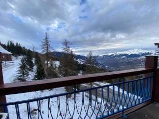 Experience breathtaking mountain views from this stunning property, perfect for a ski getaway.