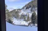 Experience breathtaking mountain views from this charming property, perfect for a ski getaway.