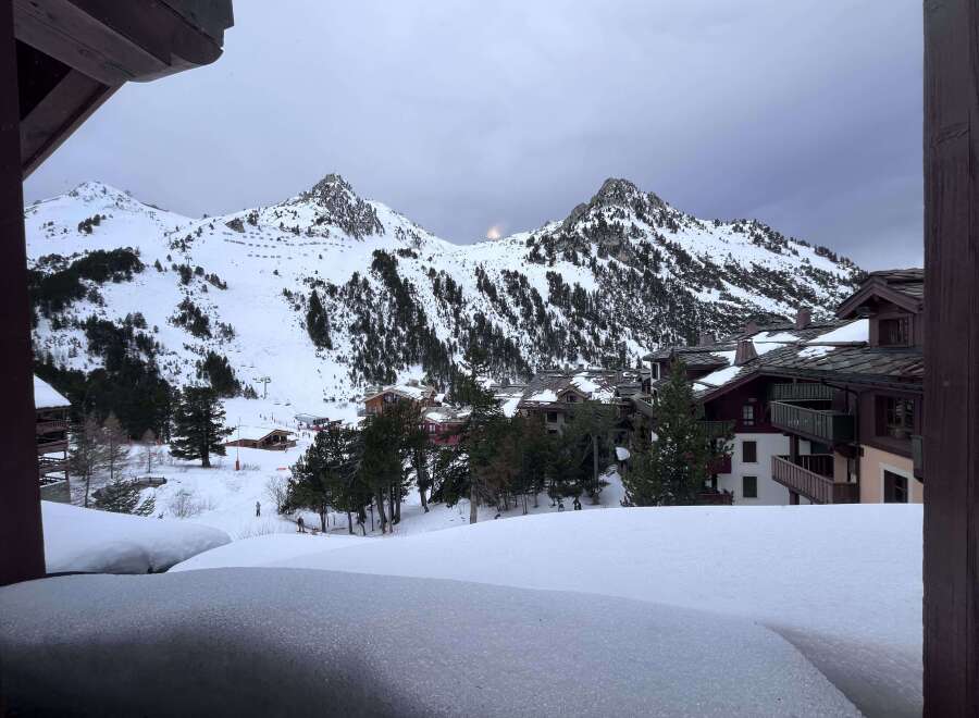 Experience the ultimate mountain getaway with this stunning property offering breathtaking views of snow-capped peaks and a charming ski village.