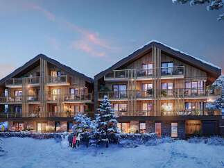 Experience luxury mountain living in this stunning alpine residence, featuring a modern wooden facade and expansive balconies perfect for enjoying breathtaking winter vistas.
