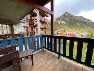 Enjoy breathtaking mountain views from this charming balcony, perfect for your morning coffee or evening relaxation.
