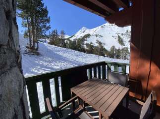 Experience breathtaking mountain views from this charming balcony, perfect for enjoying your morning coffee or evening relaxation.