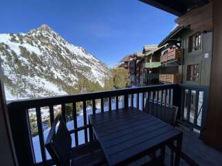 Experience breathtaking mountain views from this charming balcony, perfect for enjoying your morning coffee or evening relaxation.