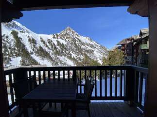 Experience breathtaking mountain views from this stunning balcony, perfect for enjoying your morning coffee or evening wine.