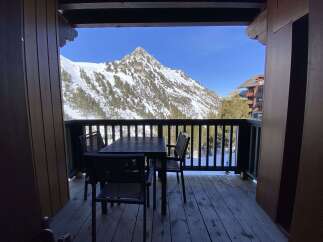 Experience breathtaking mountain views from this charming balcony, perfect for enjoying your morning coffee or evening wine.