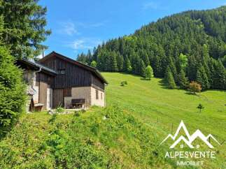 Discover this charming rustic property nestled in a serene mountain landscape.