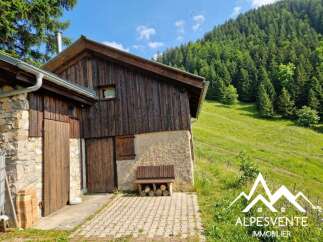 Discover this charming rustic property nestled in a serene mountain landscape.