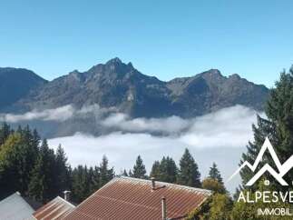Experience breathtaking mountain views from this stunning property, nestled above a sea of clouds.