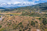 Discover luxury living in this expansive mountain estate, featuring modern architectural homes nestled into the scenic landscape.