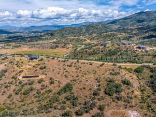 Discover luxury living in this expansive mountain estate, featuring modern architectural homes nestled into the scenic landscape.