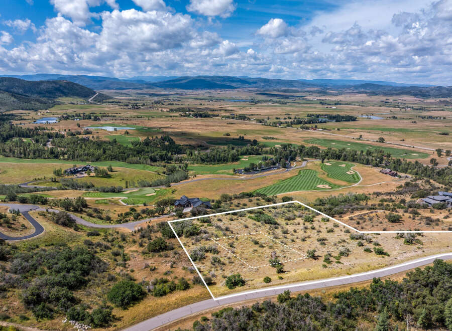Discover this prime building lot offering breathtaking panoramic views of the surrounding mountains and golf course.
