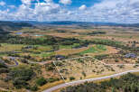 Discover this prime building lot offering breathtaking panoramic views of the surrounding mountains and golf course.