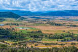 Experience luxury living with this stunning mountain view property, featuring a pristine golf course and serene lakes.