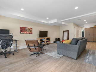 Discover this versatile living space, perfect for both work and relaxation.