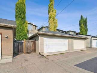 Discover ample parking and storage with this property, featuring a spacious double garage and an additional single-car garage.