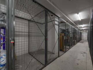 Secure your belongings in this spacious storage unit, perfect for decluttering your home or safeguarding seasonal items.