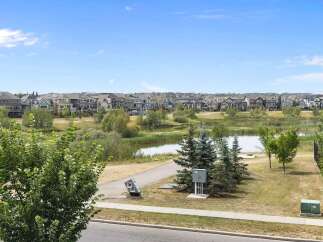 Discover this picturesque neighborhood featuring a serene pond and walking paths, perfect for outdoor enthusiasts.