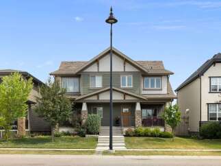 Discover modern living in this stunning semi-detached home, featuring a welcoming porch and elegant stone accents.
