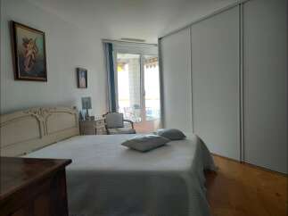 Experience comfort and style in this beautifully appointed bedroom, featuring a plush bed and elegant decor.