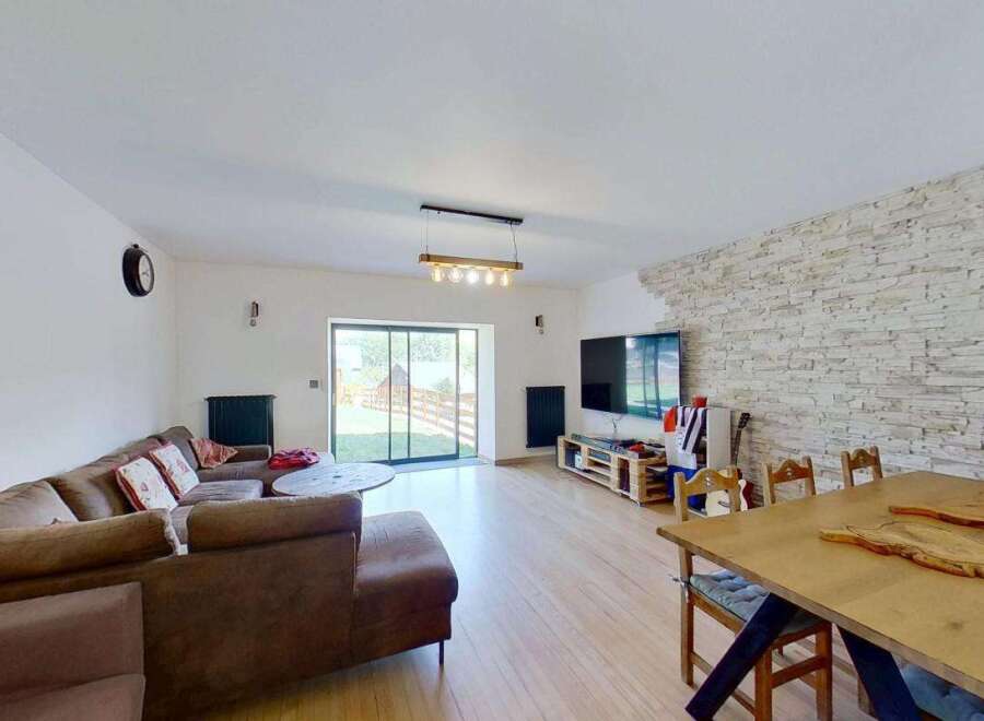 Discover this spacious living and dining area, perfect for entertaining.