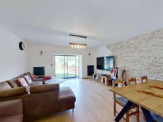 Discover this spacious living and dining area, perfect for entertaining.