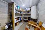 Discover ample storage solutions in this versatile basement space, perfect for organizing your belongings.