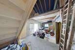 Discover this versatile garage space, perfect for storing vehicles like ATVs and motorcycles.