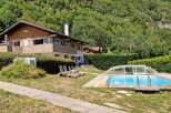 Discover this charming property featuring a spacious house with a balcony, perfect for enjoying the mountain views.