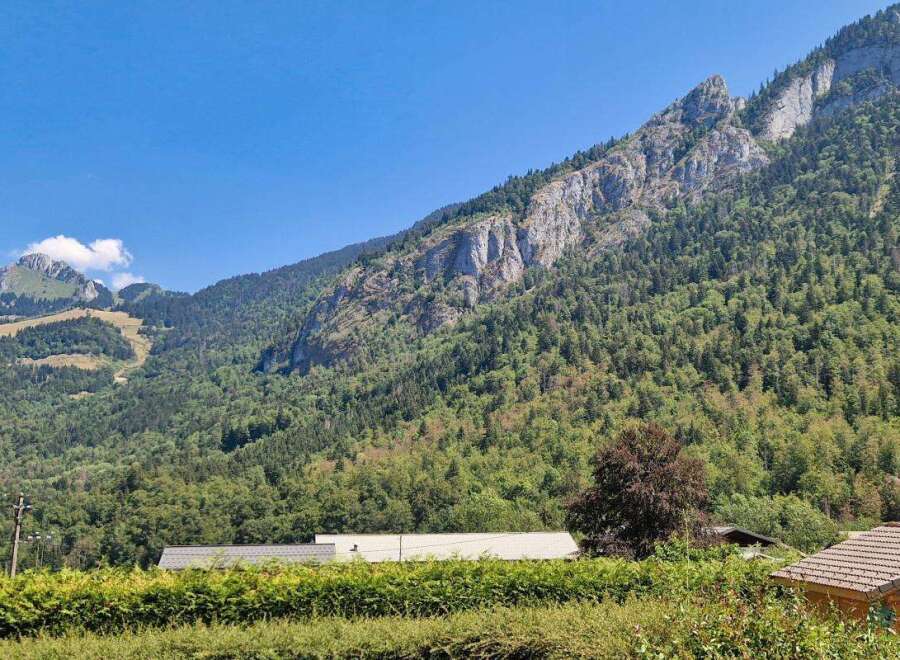 Nestled against a majestic mountain backdrop, this property offers a serene escape with stunning natural views.