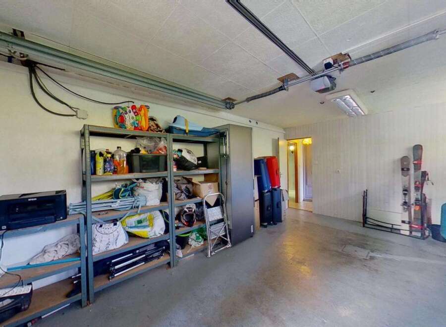 Discover ample storage solutions in this versatile garage space, perfect for organizing all your recreational gear and equipment.
