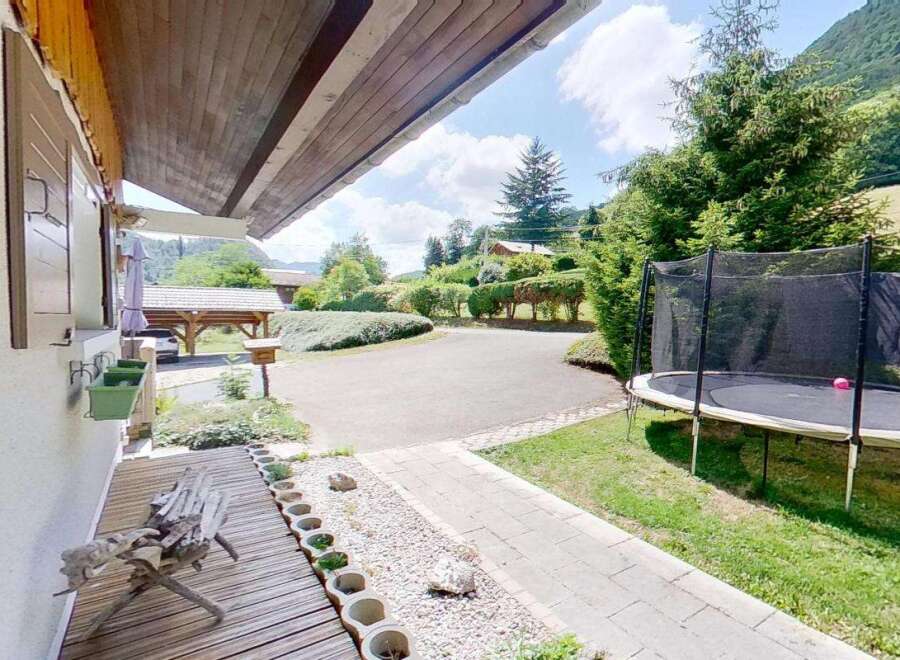 Enjoy outdoor fun with this spacious trampoline, perfect for family entertainment.