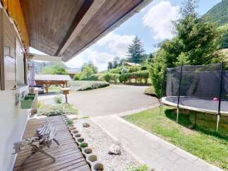 Enjoy outdoor fun with this spacious trampoline, perfect for family entertainment.