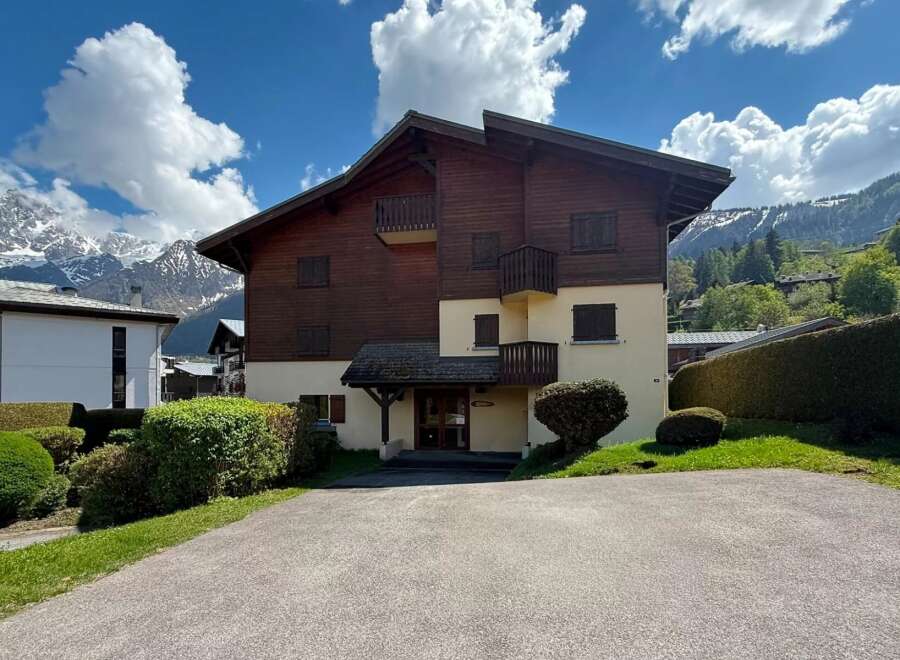 Experience mountain living in this charming property featuring a blend of traditional wood and modern design.