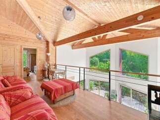 Experience rustic charm and modern comfort in this stunning wooden home.