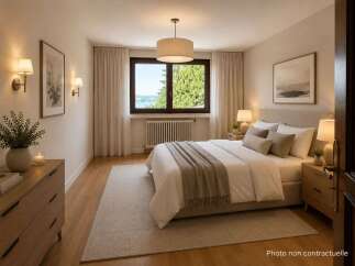 Experience serene living in this beautifully appointed bedroom, featuring a plush king-size bed and elegant bedside tables.
